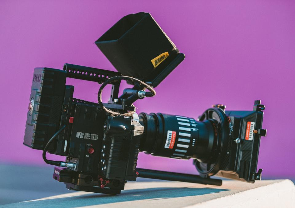 Cinema camera on a tripod for the article on starting a YouTube channel