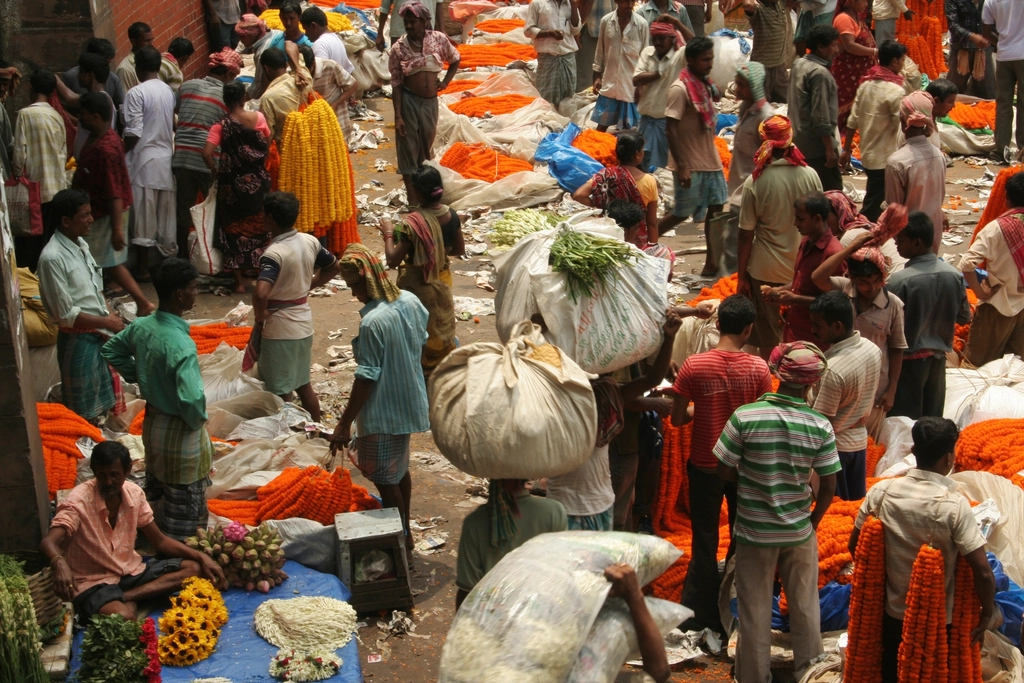 Busy traditional Indian market, representing a family-run business considering digital transformation